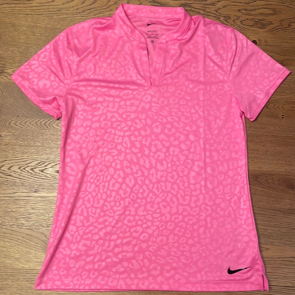 Never worn pink Nike golf shirt